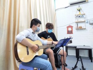 dạy đàn guitar quận 8