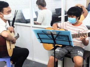 lớp guitar đệm hát quận 8